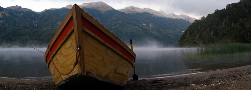 Fly fisherman and boat